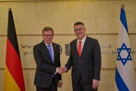 Johann Wadephul shaking hands with Israeli Foreign Minister Gideon Sa'ar at the Israeli Foreign Ministry